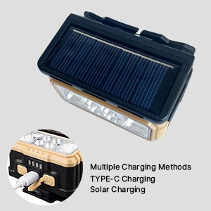 Solar motion sensor headlamp charging methods